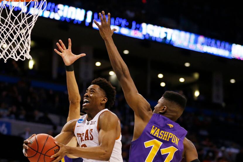 Texas Longhorns guard Isaiah Taylor (1) attempts a shot in front of Northern Iowa Panthers...