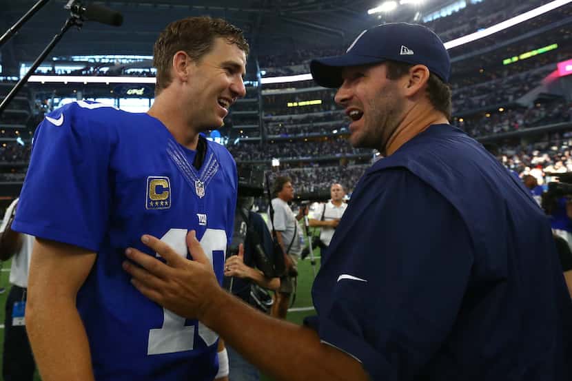 ARLINGTON, TX - SEPTEMBER 11:  (R-L) Injured Dallas Cowboys quarterback Tony Romo...
