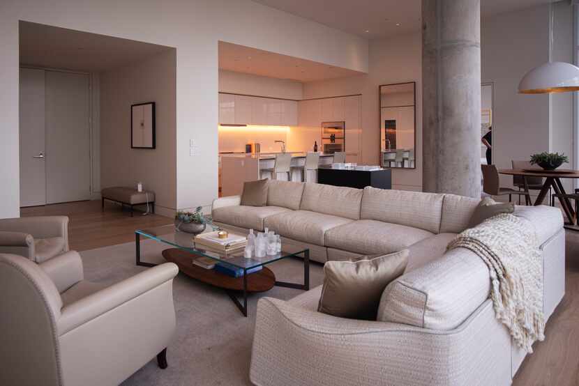 The living room area inside a model condo at the Hall Arts Residences.