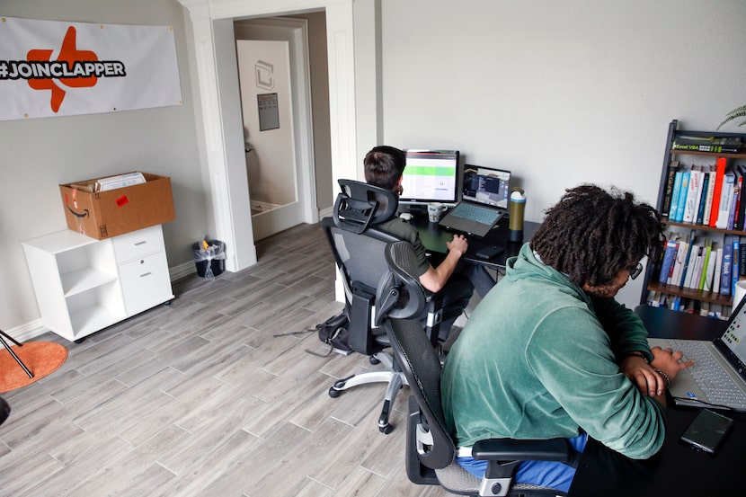 Clapper employees work at the Clapper offices on Friday, April 7, 2023 in Carrollton, Texas.