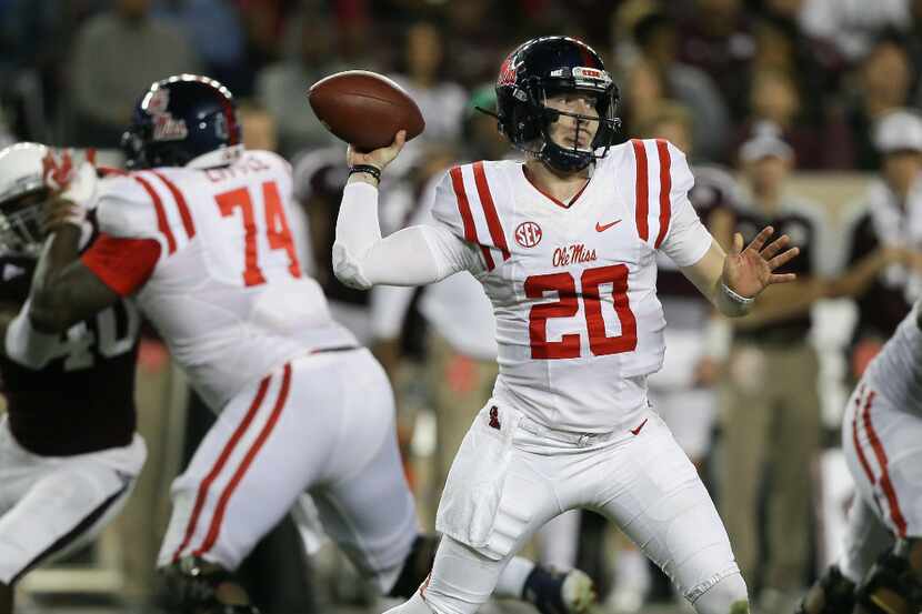 COLLEGE STATION, TX - NOVEMBER 12:  Shea Patterson #20 of the Mississippi Rebels looks for a...