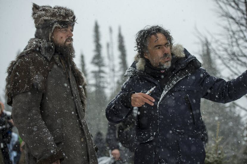 Director Alejandro G. Inarritu (right) working with Leonardo DiCaprio during the making of...