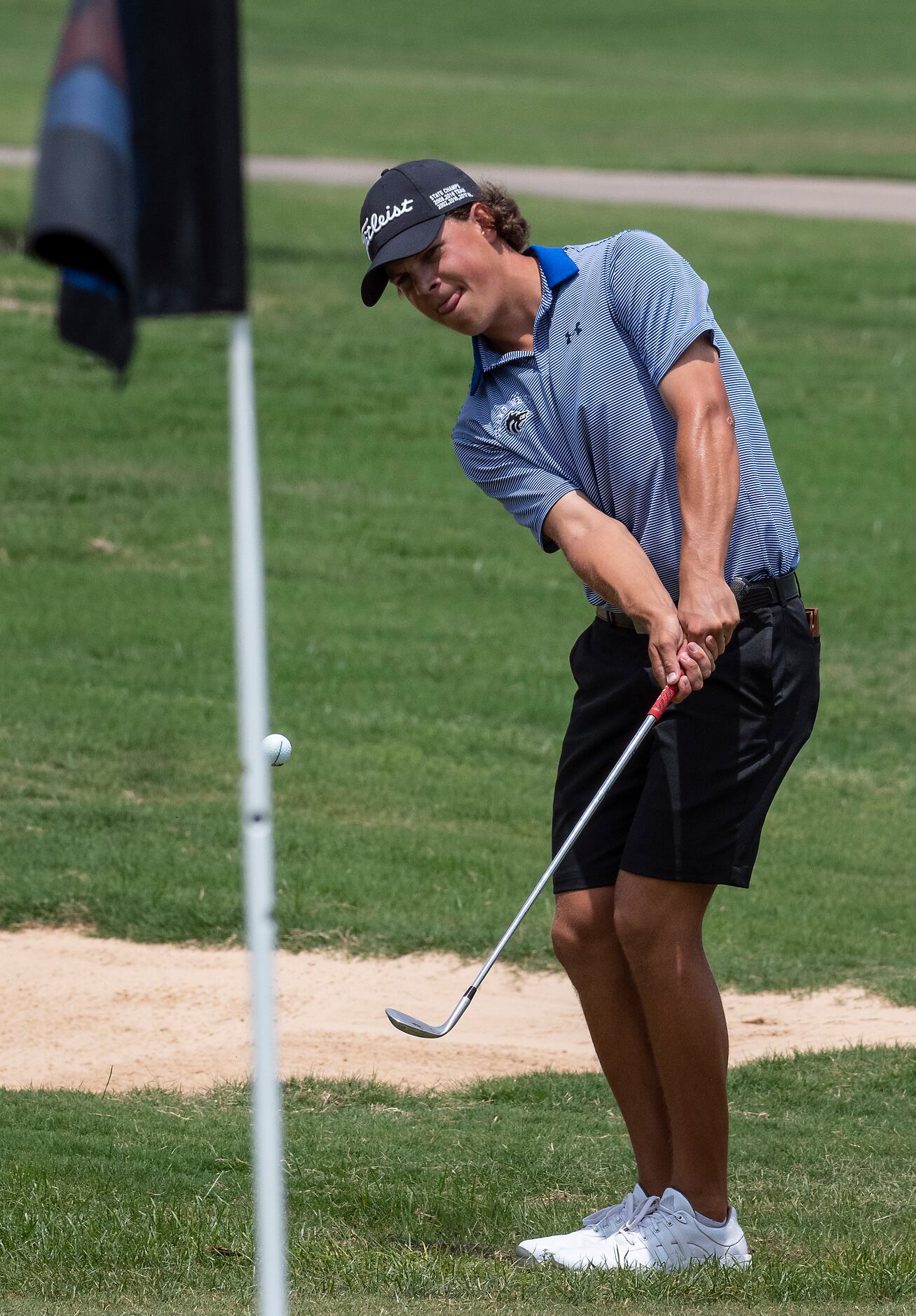 Plano West Matt Comegys chips in on the 18th green for an eagle to win the UIL 6A Boys...