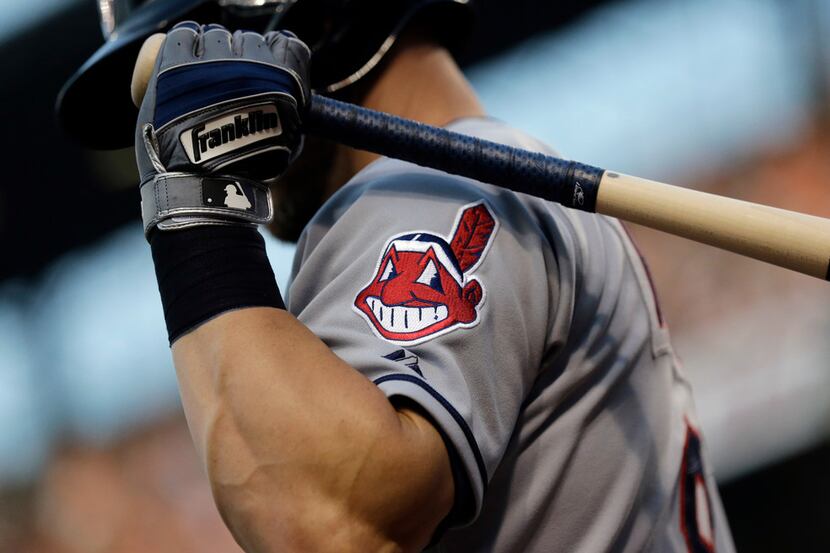 FILE - This June 26, 2015, file photo, shows the Cleveland Indians logo on a jersey during a...