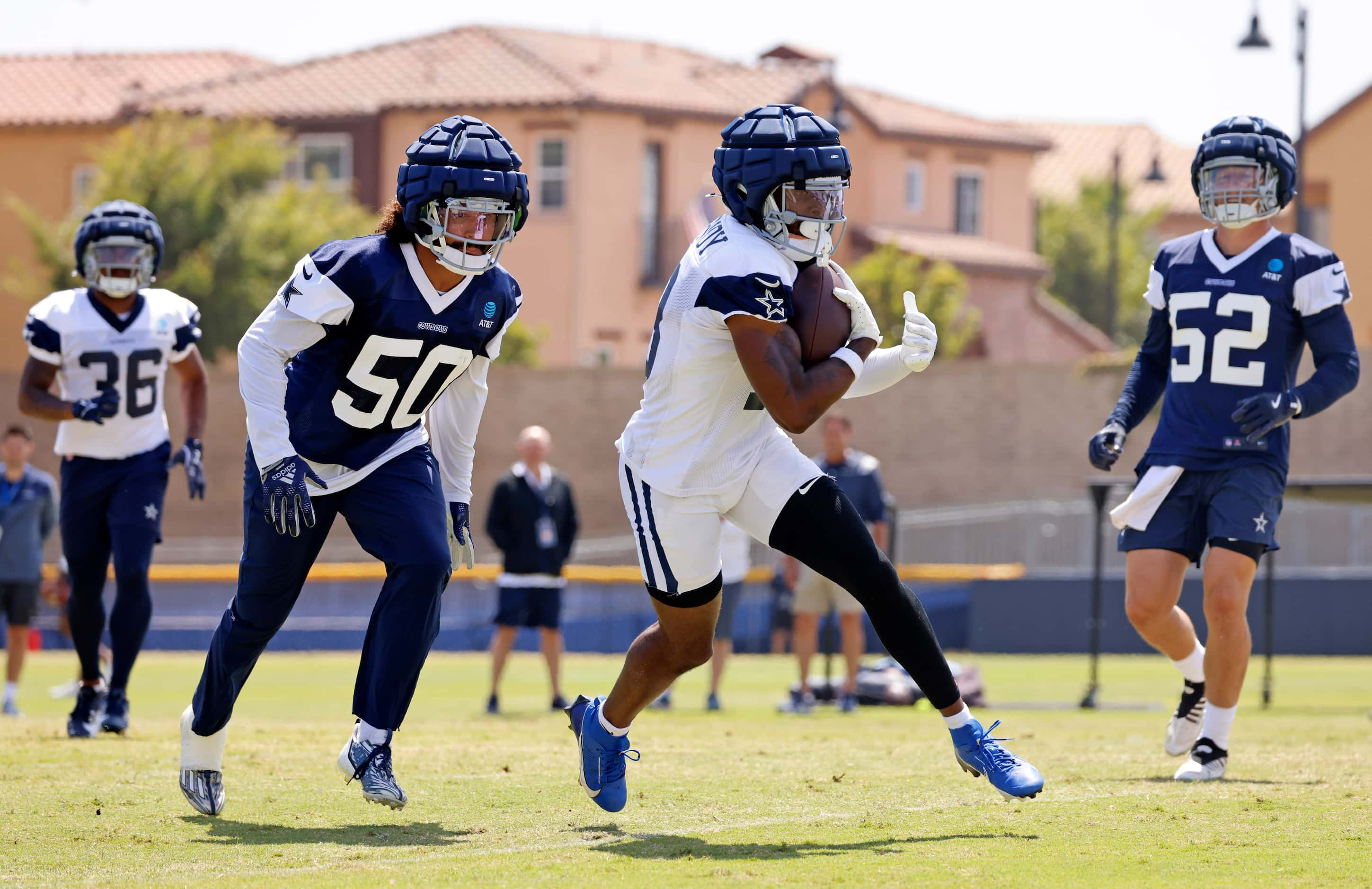 Dallas Cowboys wide receiver Ryan Flournoy (18) catches a pass across the middle a he’s...