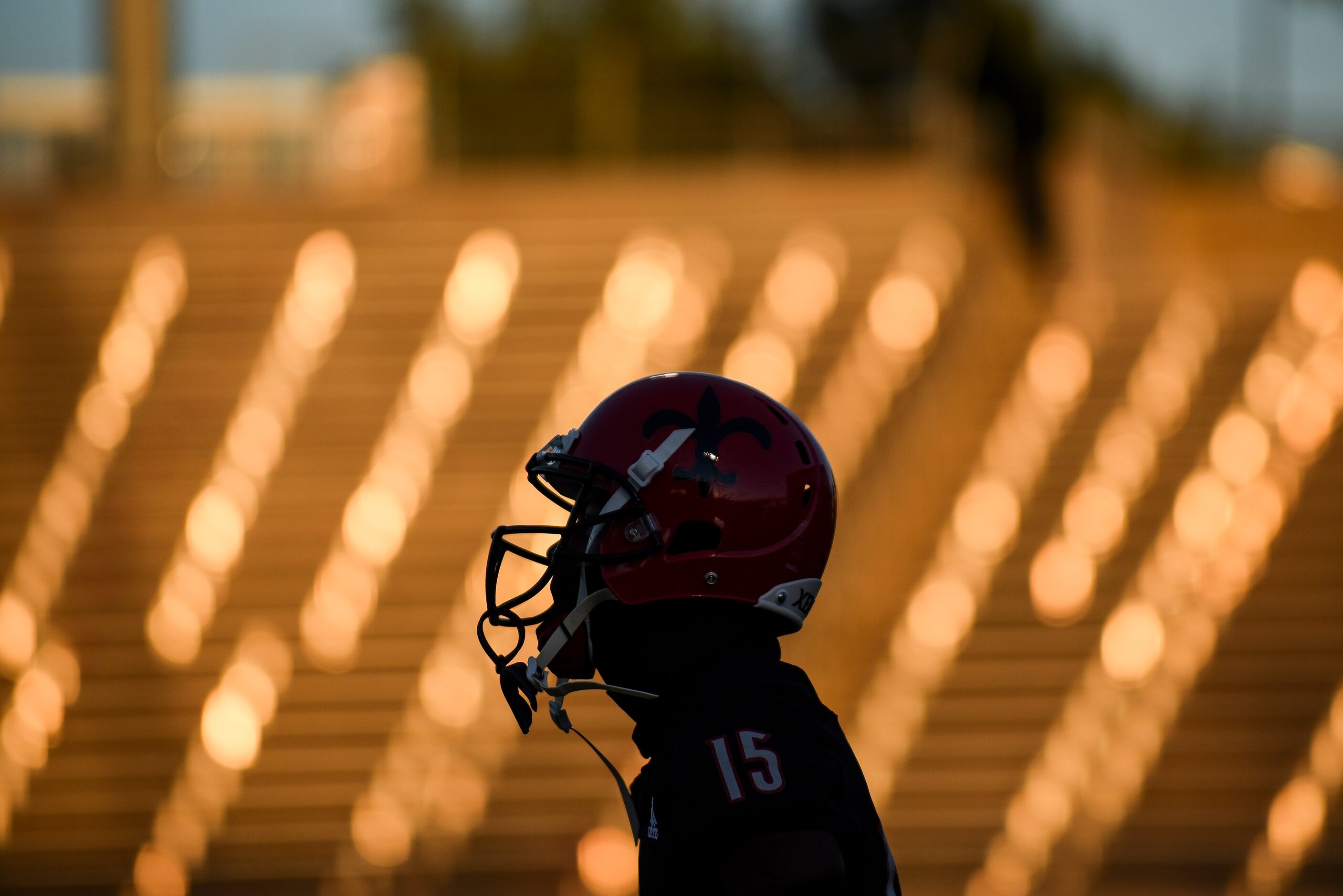 Kimball junior Cedric Robertson (15) warms up before the start of the District 6-5A Division...