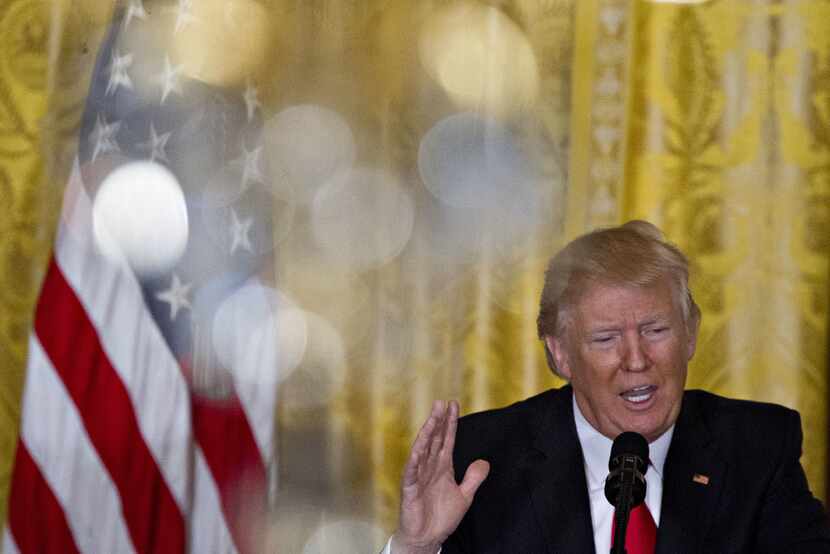 U.S. President Donald Trump speaks during a news conference to announce Alexander Acosta as...