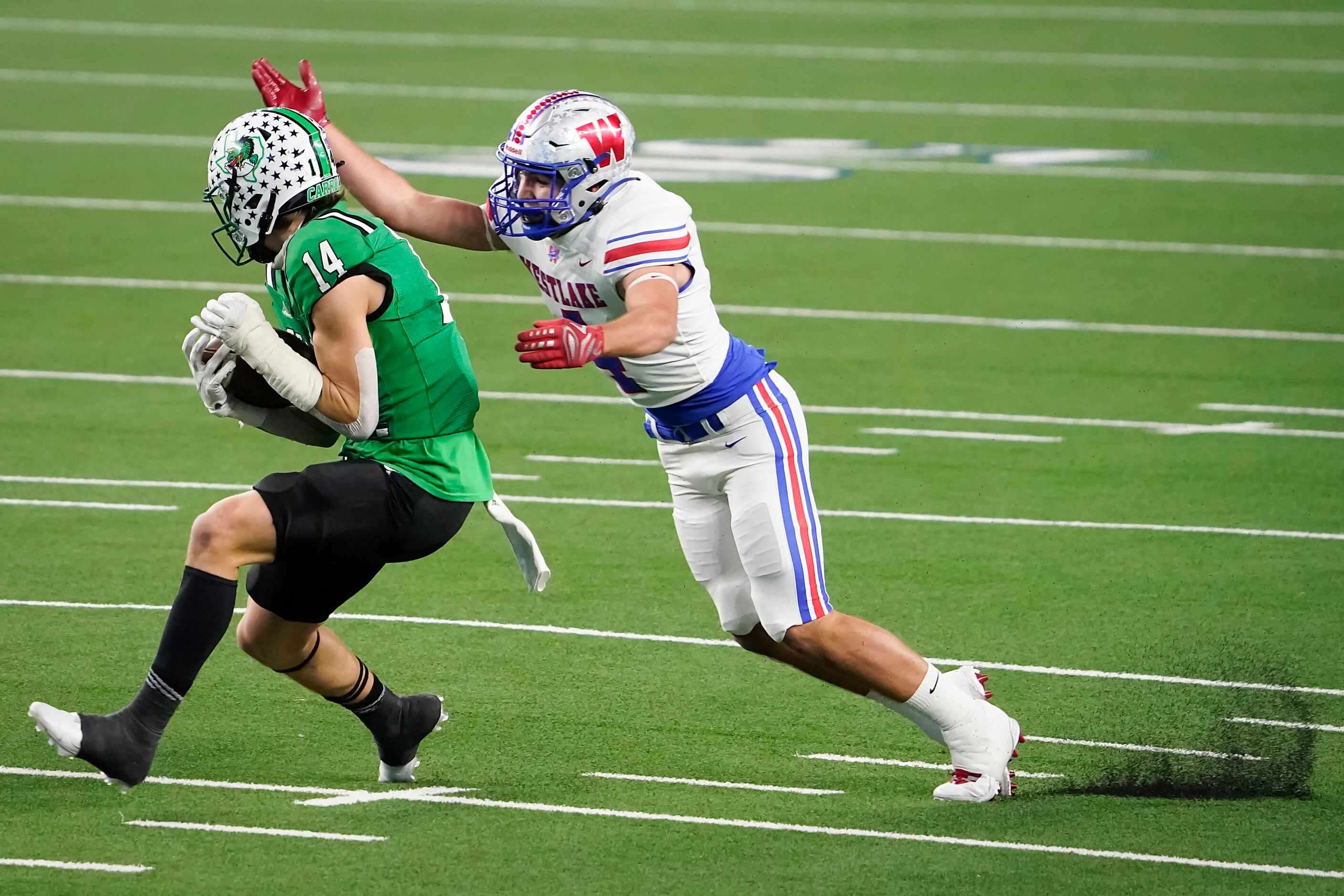 Southlake Carroll wide receiver Brady Boyd (14) catches a pass on a 49-yard touchdown past...