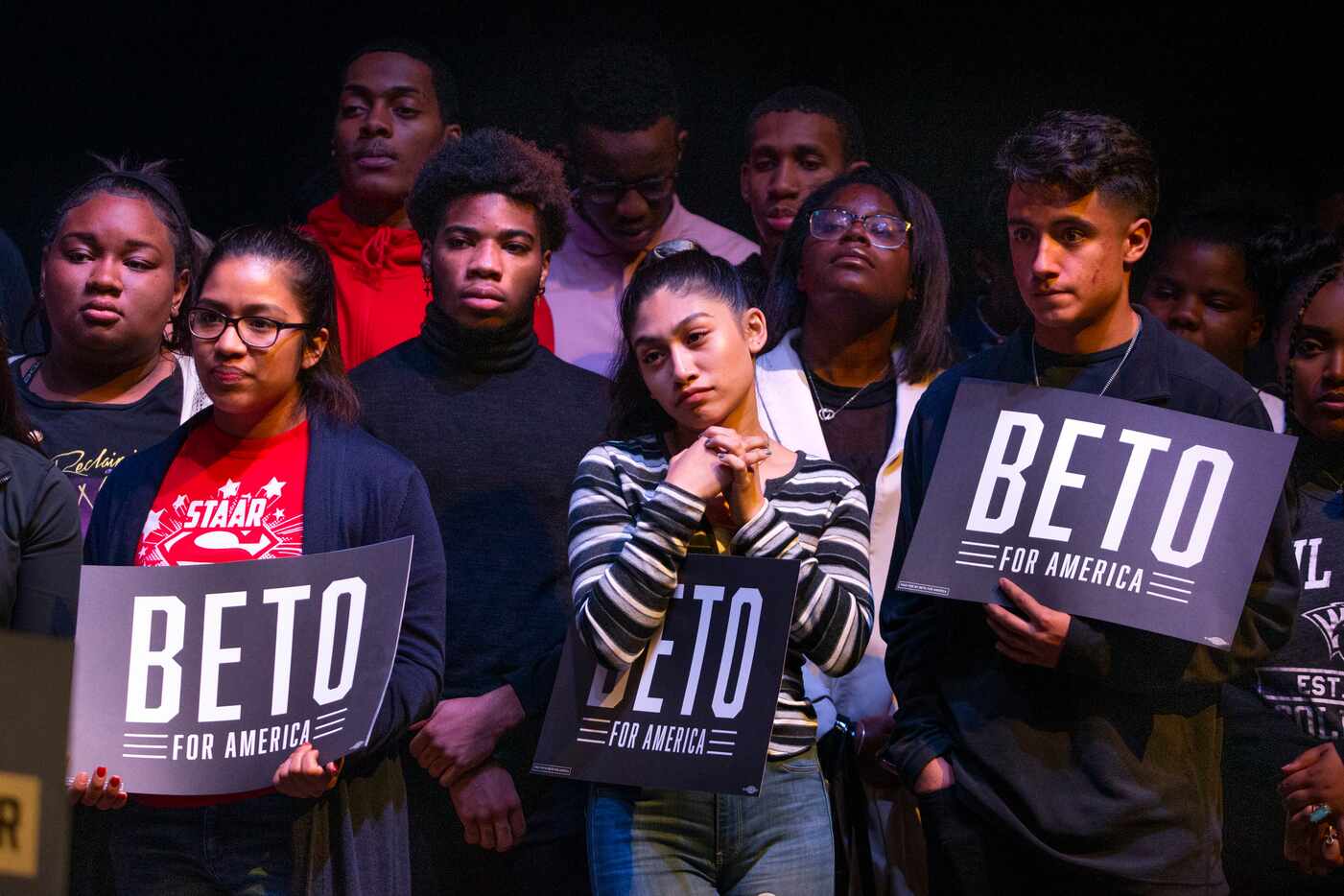 Supporters listen to democratic presidential candidate and former Texas Rep. Beto O'Rourke...