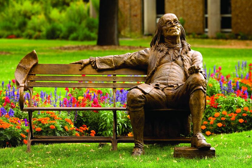 There are eight bronze life-size sculptures of nine historic men — including Benjamin...