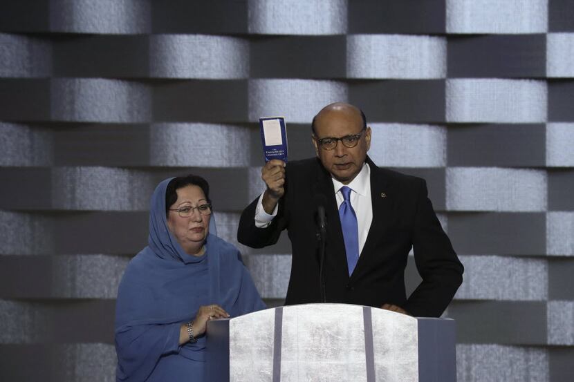 The father of a fallen Muslim-American soldier, Khizr Khan, with his wife, Ghazala Khan, at...