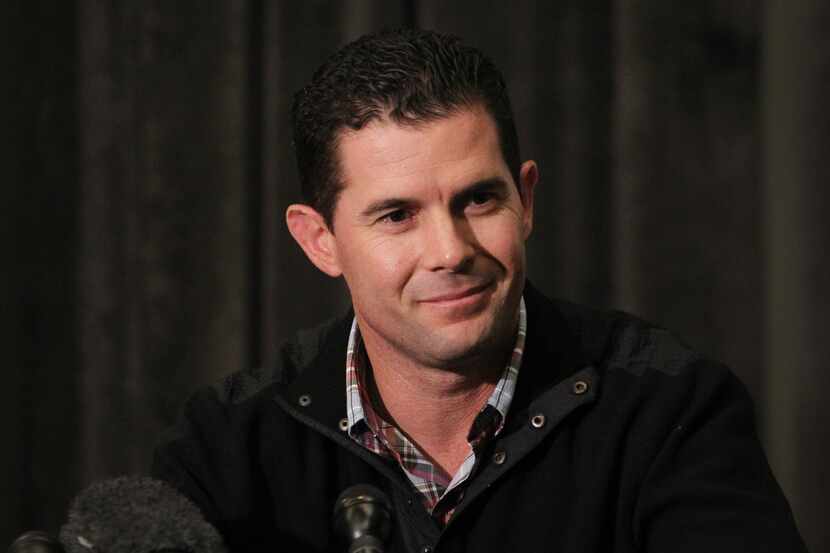 Former Texas Rangers infielder Michael Young holds a farewell news conference following his...