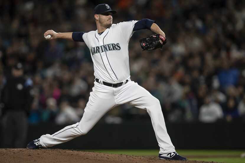 SEATTLE, WA - APRIL 13: Reliever Connor Sadzeck #54 of the Seattle Mariners delivers a pitch...