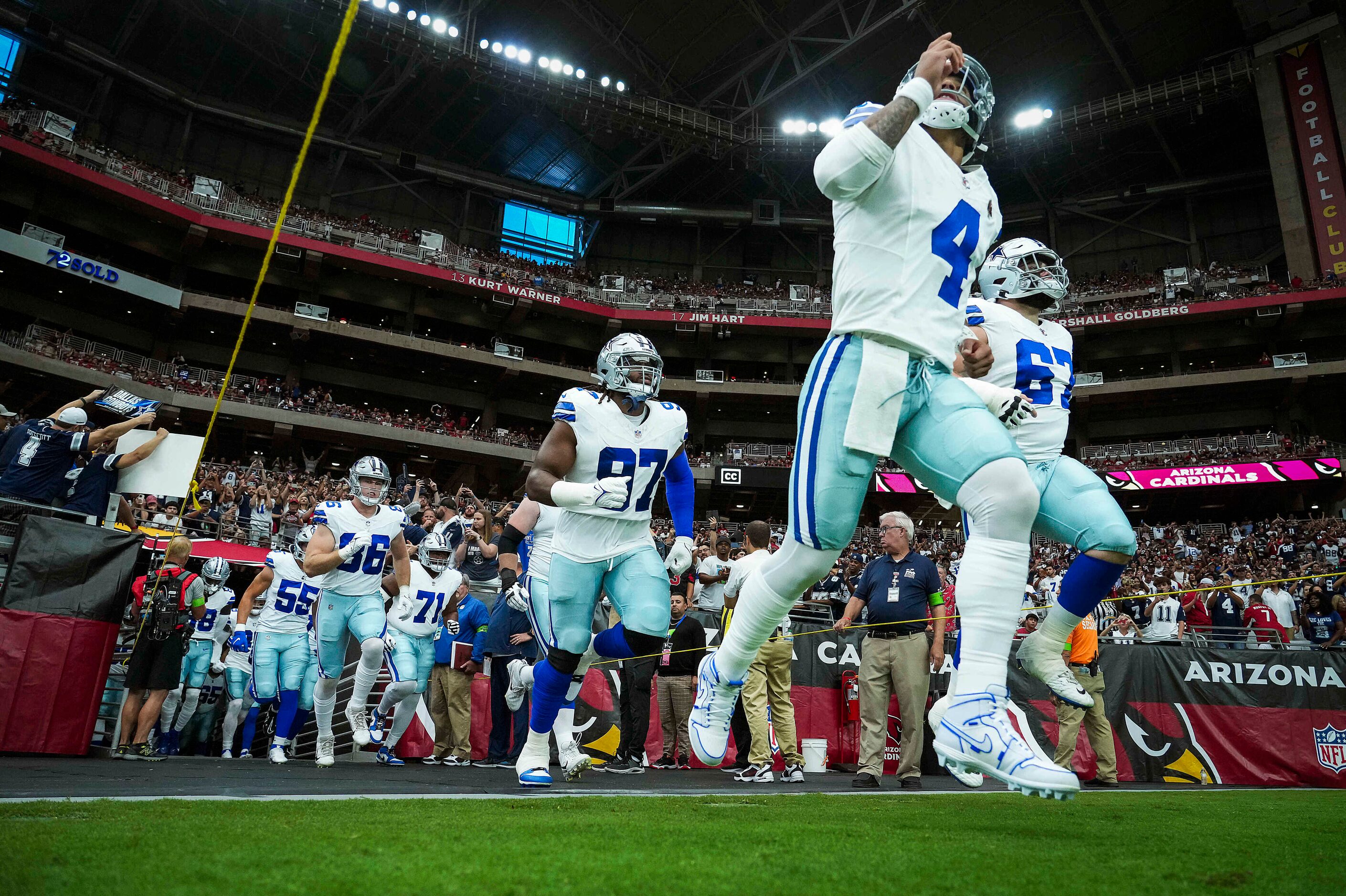 Dallas Cowboys quarterback Dak Prescott (4) takes the field before an NFL football game...