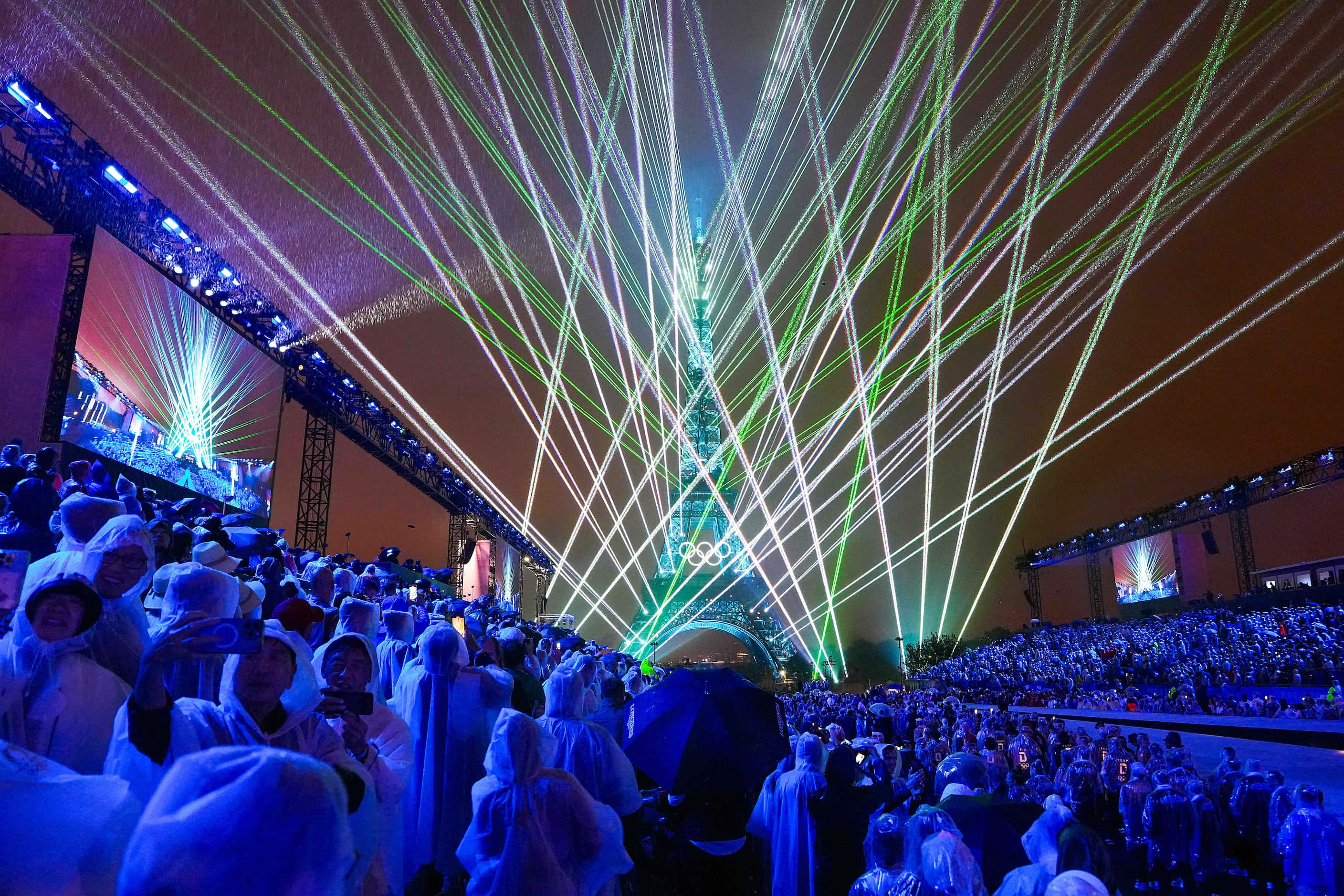 A light show illuminates the Eiffel Tower during opening ceremonies for the 2024 Summer...