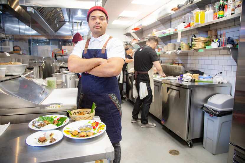 Donny Sirisavath poses for a photo in the kitchen of his restaurant Khao Noodle Shop  in...