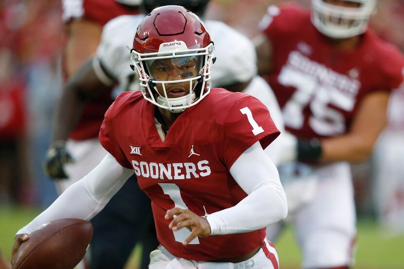 FILE - In this Sept. 22, 2018, file photo, Oklahoma quarterback Kyler Murray (1) carries for...