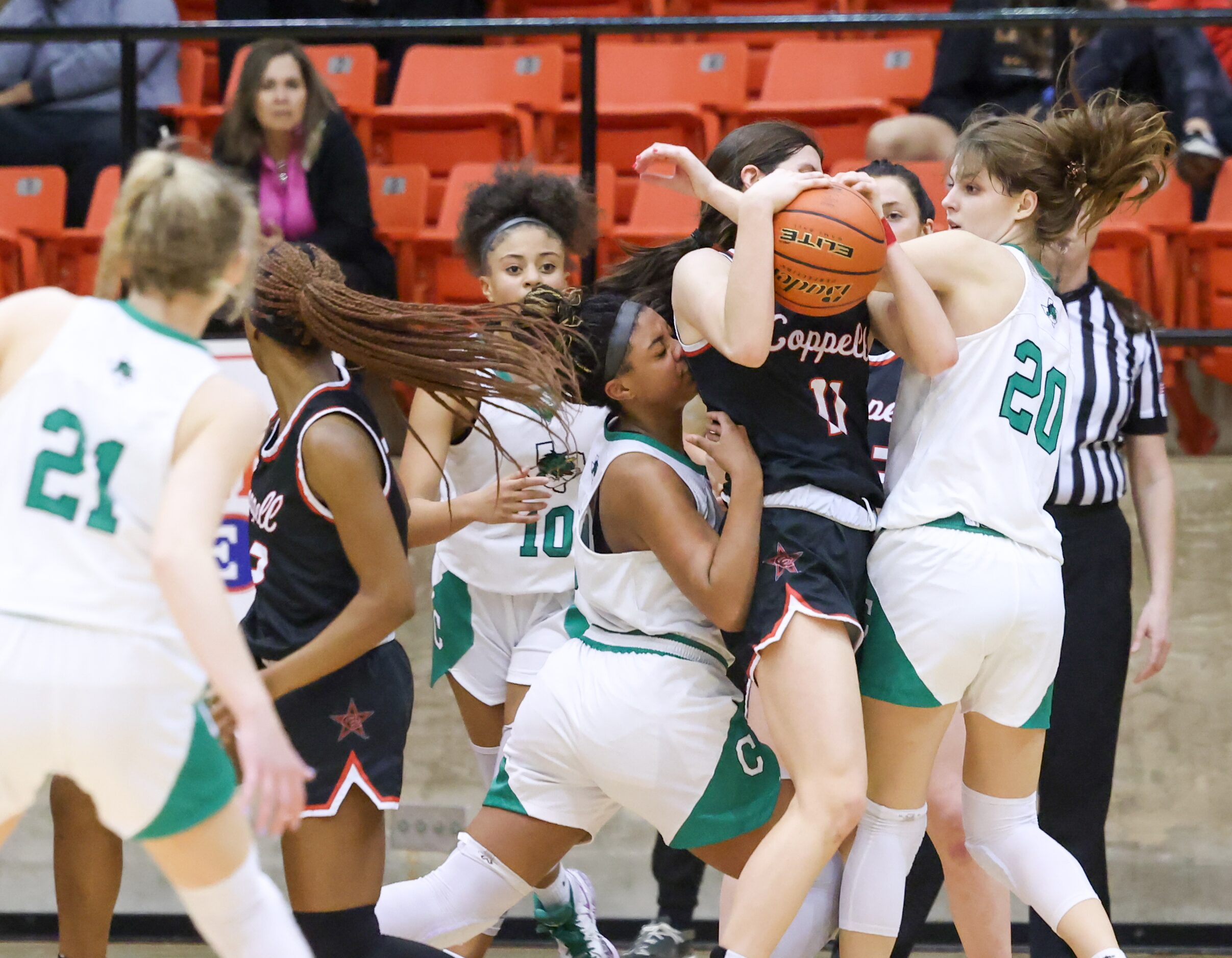 Southlake Carroll freshman guard Natalia Jordan (11, left), Coppell senior guard Waverly...