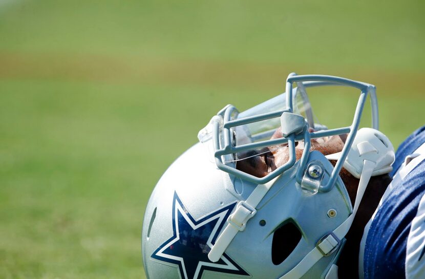 Dallas Cowboys free safety Byron Jones (31) stretches before afternoon practice at training...