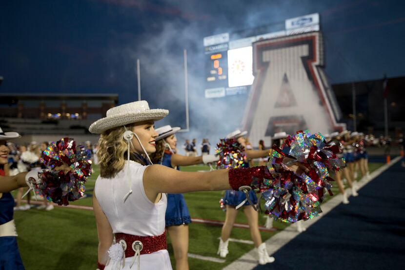 The Allen Eagles drill team on field before the introduction of the players during high...