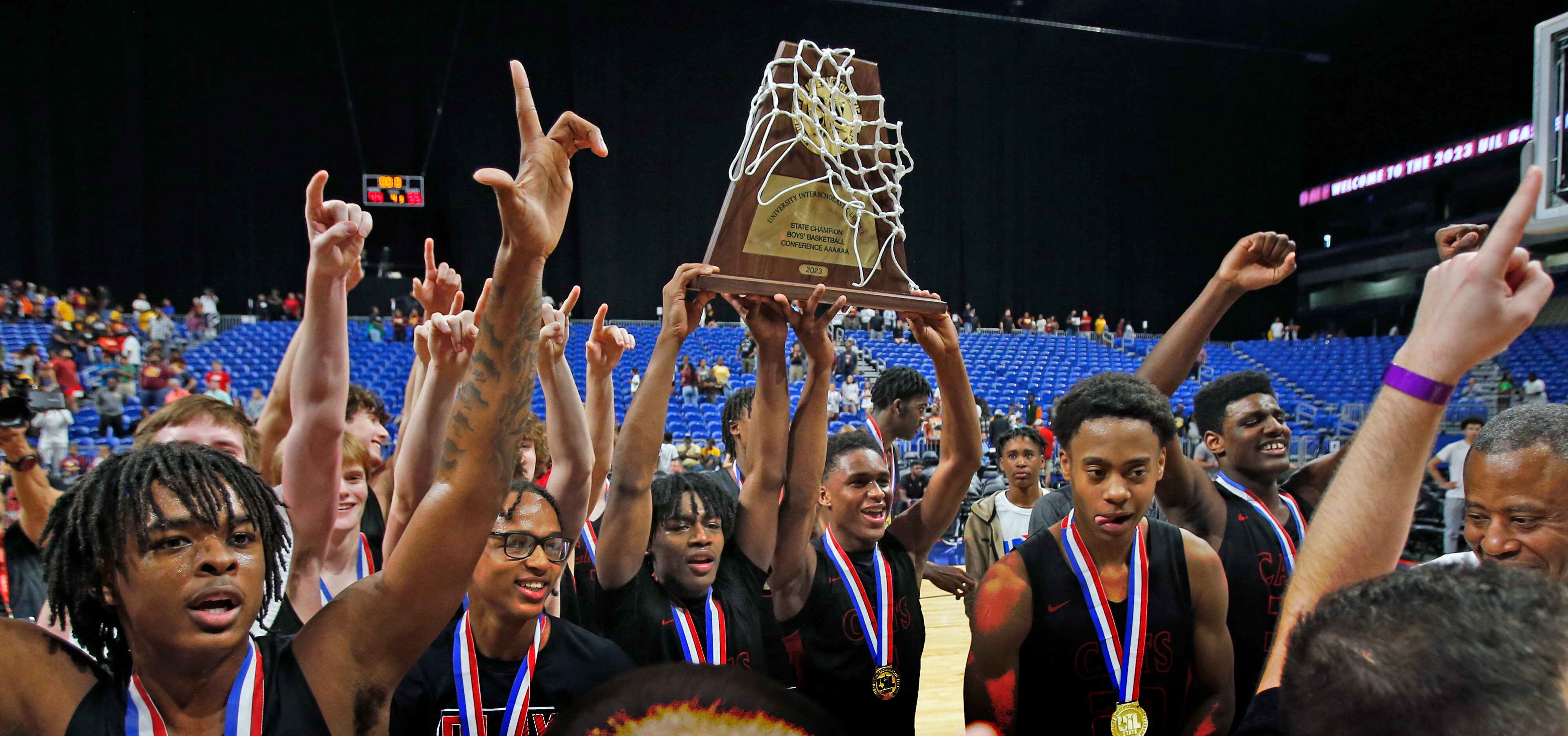 Lake Highlands celebrates with their trophy. Lake Highlands defeated Beaumont United in boys...