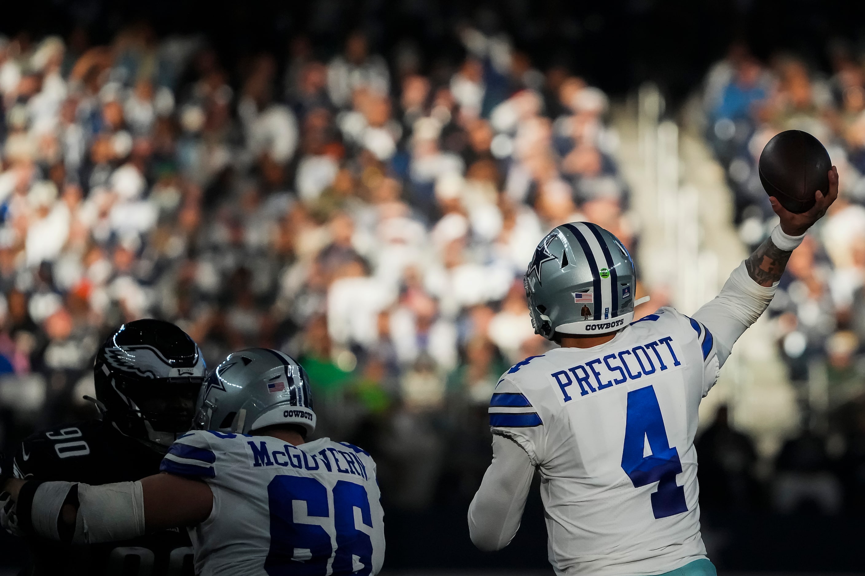 Dallas Cowboys quarterback Dak Prescott (4) throws a pass during the second quarter of an...