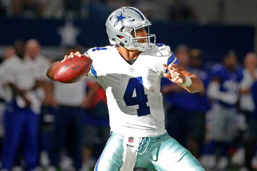 Dallas Cowboys quarterback Dak Prescott (4) throws a fourth quarter pass during the New York...