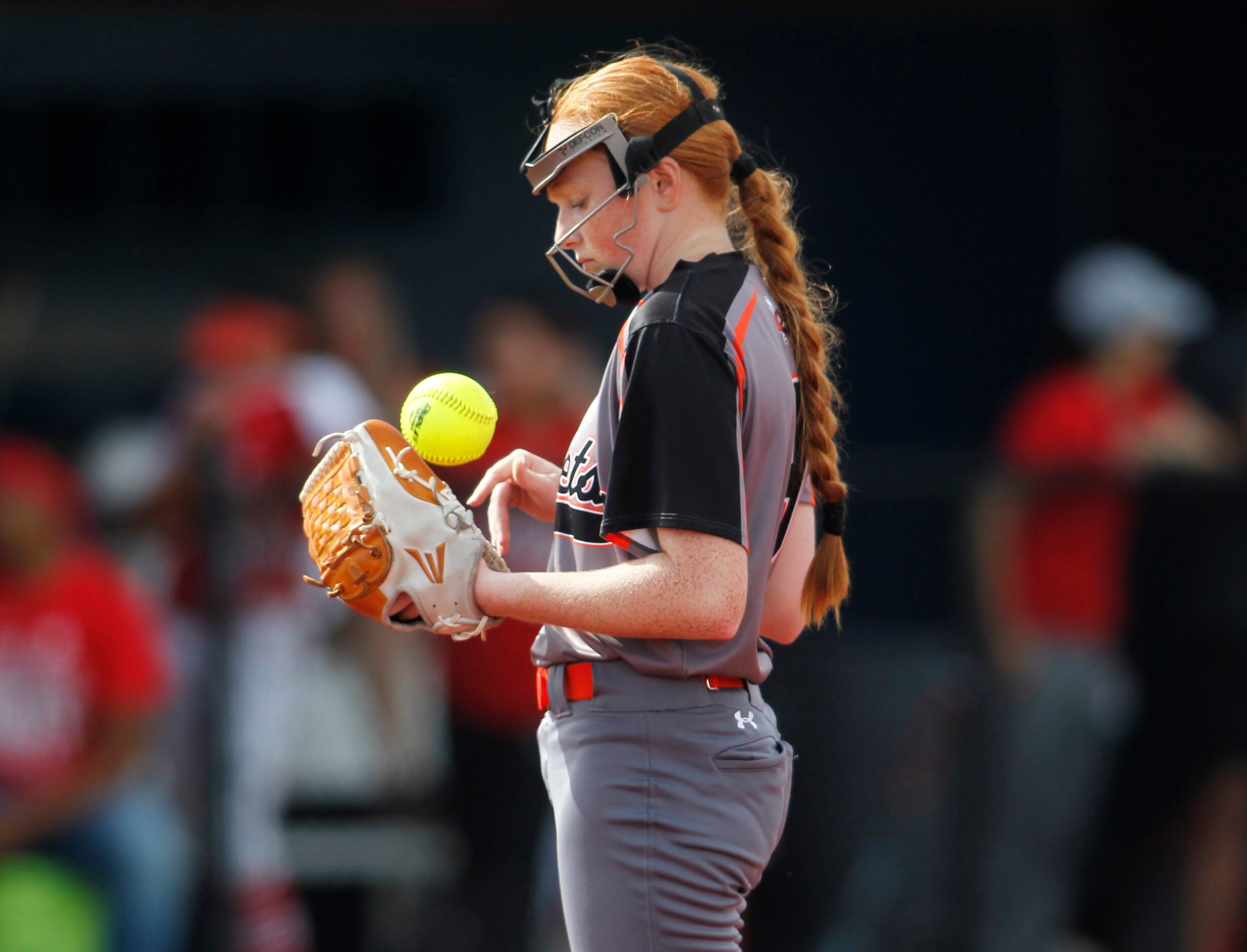 Rockwell's Ainsley Pemberton (9) takes a moment between pitches during the bottom of the 3rd...