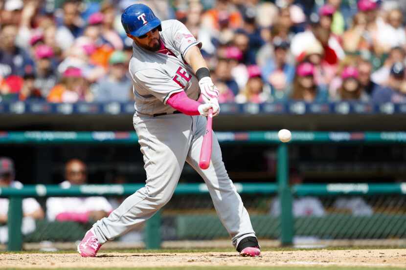 May 8, 2016; Detroit, MI, USA; Texas Rangers catcher Bobby Wilson (6) hits a grand slam home...