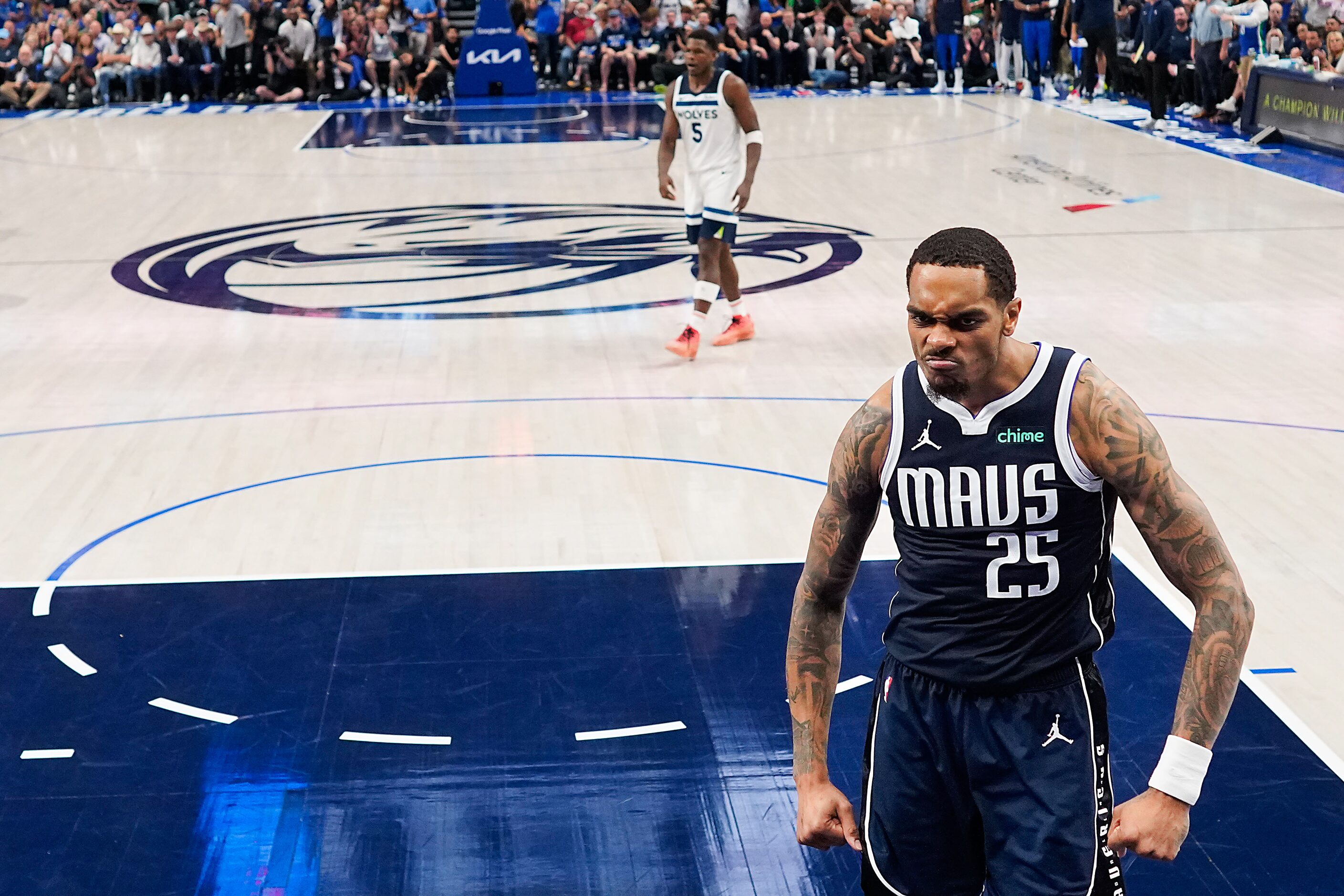 Dallas Mavericks forward P.J. Washington (25) celebrates after a defensive stop during the...