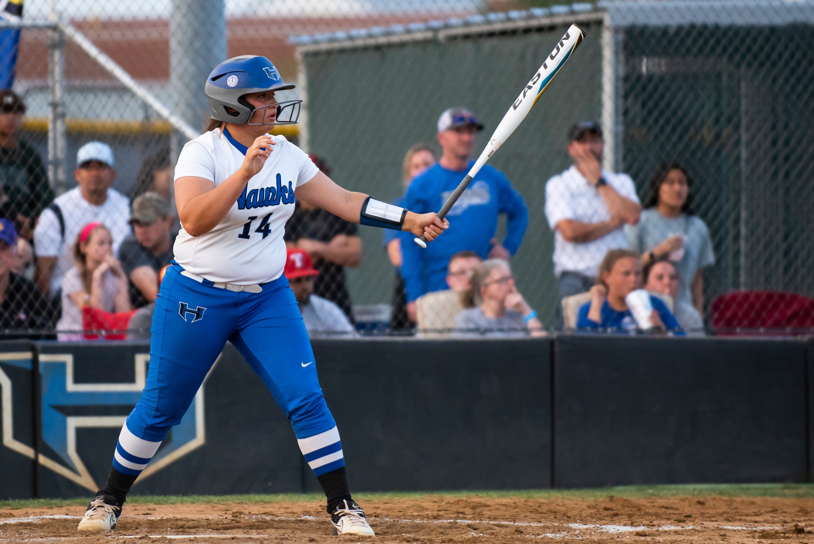 Hebron pitcher Lucy Crowder (14) gets ready for her at-bat during the District 6-6A title...