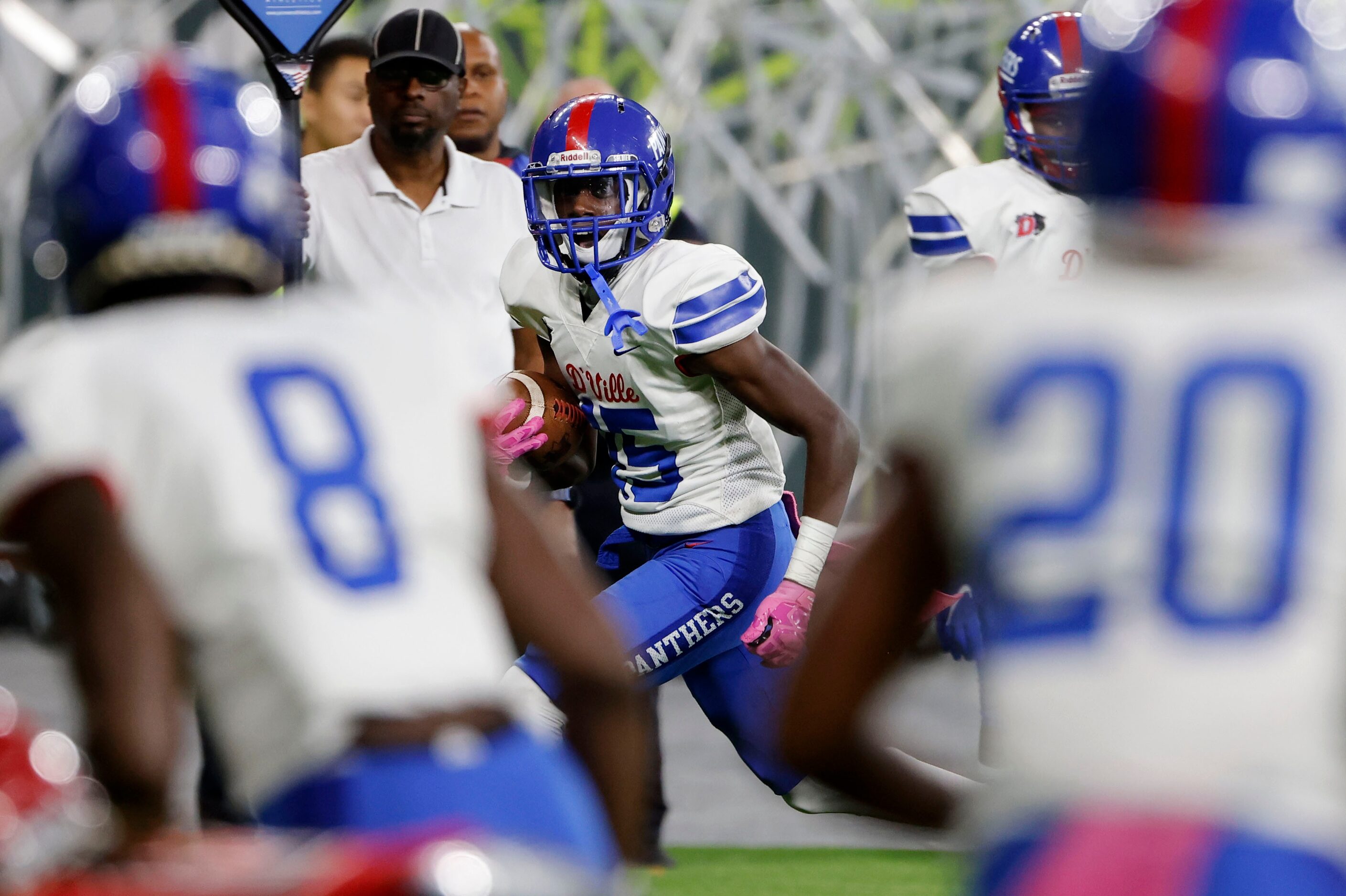 Duncaville’s Lamoderick Spencer (15) intercepts a pass for a touchdown against Cedar Hill...