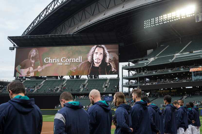 Soundgarden vocalist and guitarist Chris Cornell is pictured on the scoreboard during a...