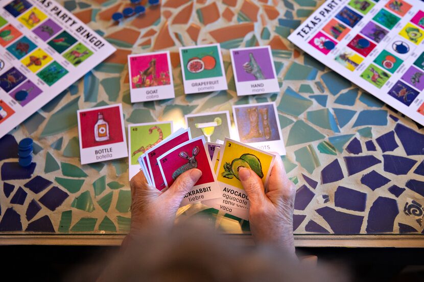 Rosemary Doyle calls the family game of Texas Party Bingo at her home in Dallas.