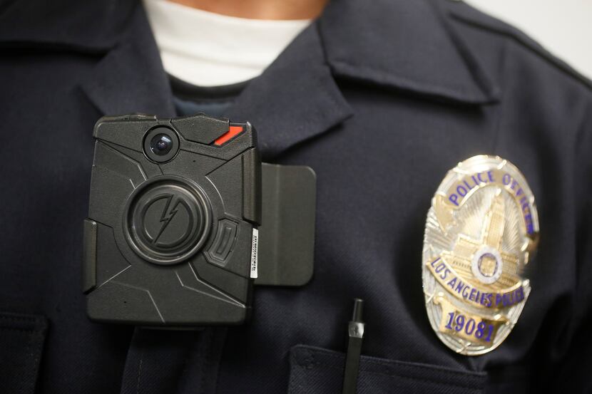 This Jan. 15, 2014 file photo shows a Los Angeles Police officer wearing an on-body cameras...