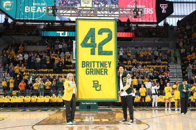 Former Baylor University legend and WNBA star Brittney Griner, right, looks on with Baylor...