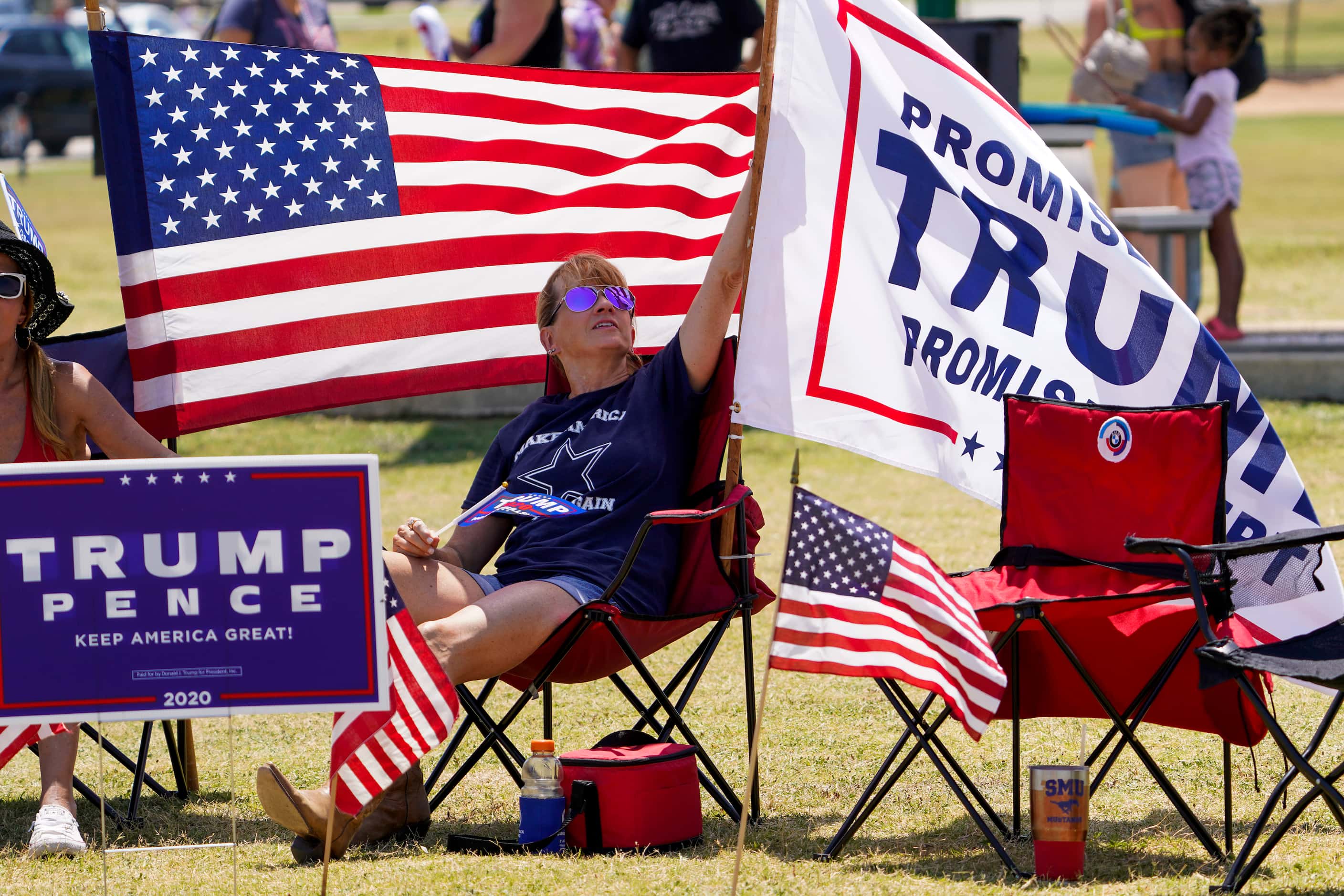 Supporters of President Donald Trump attend a campaign rally and boat parade at Oak Grove...