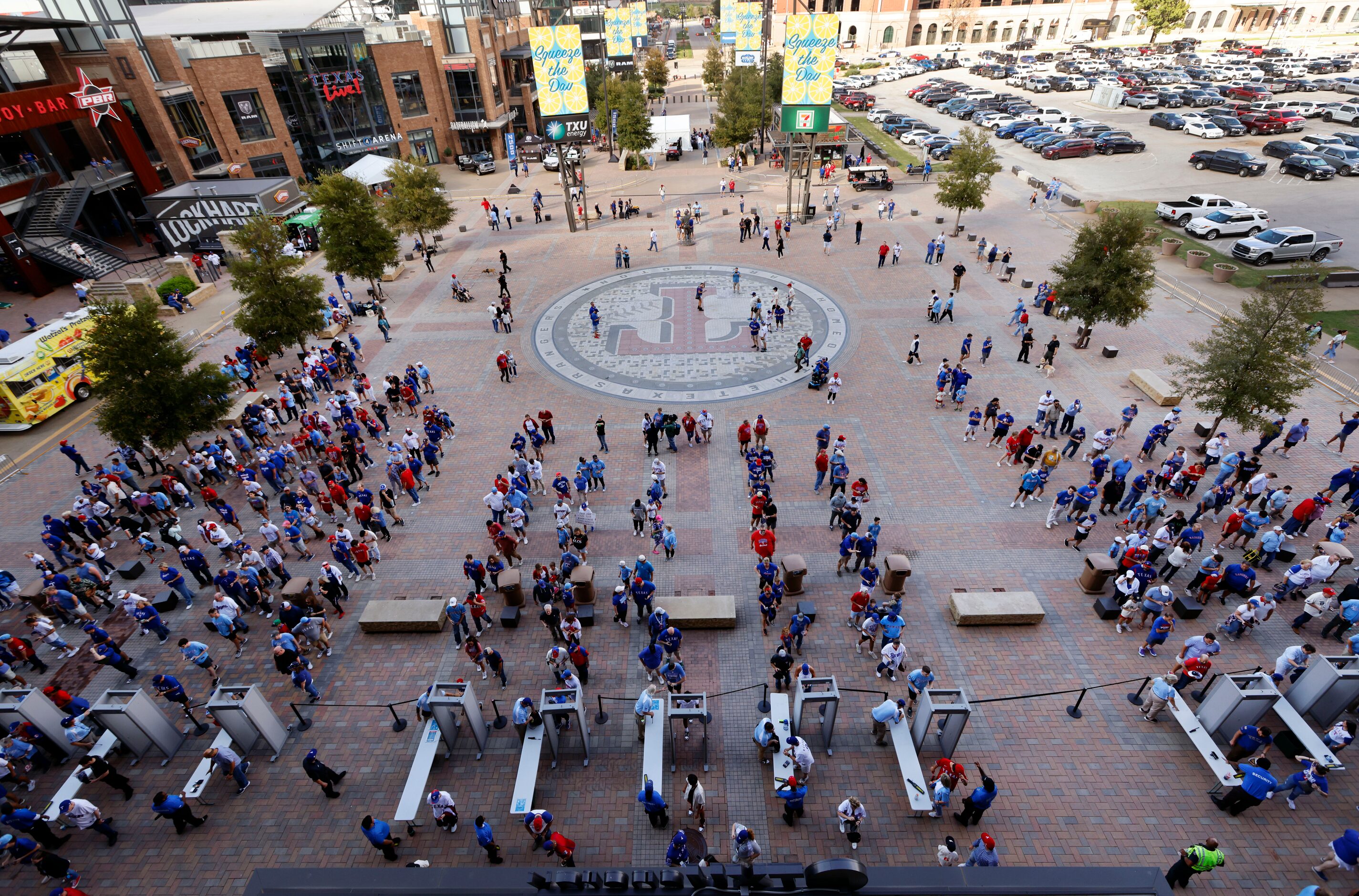 Texas Rangers fans file into Globe Life Field in Arlington before Game 1 of the World Series...