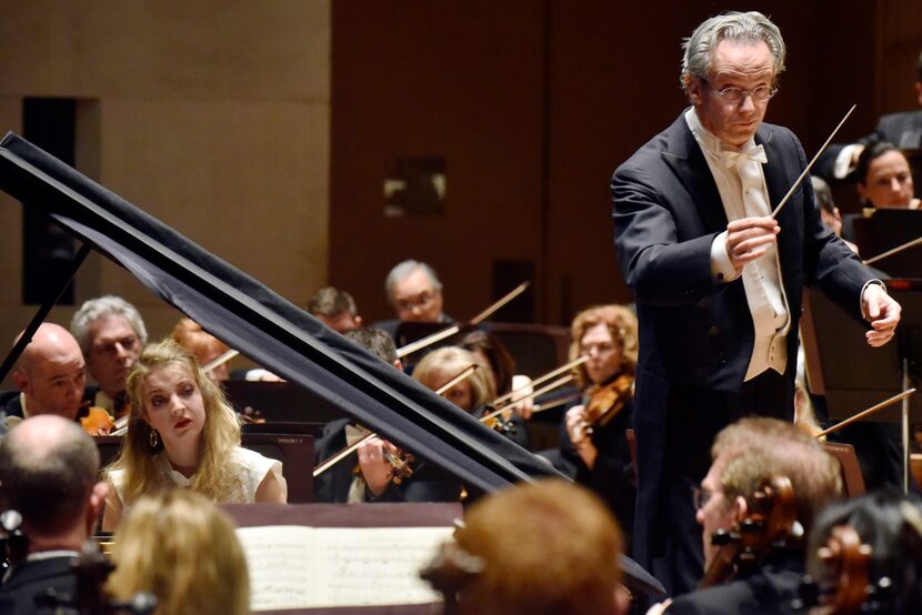 The Dallas Symphony Orchestra with conductor Fabio Luisi, right, and pianist Lise de la...