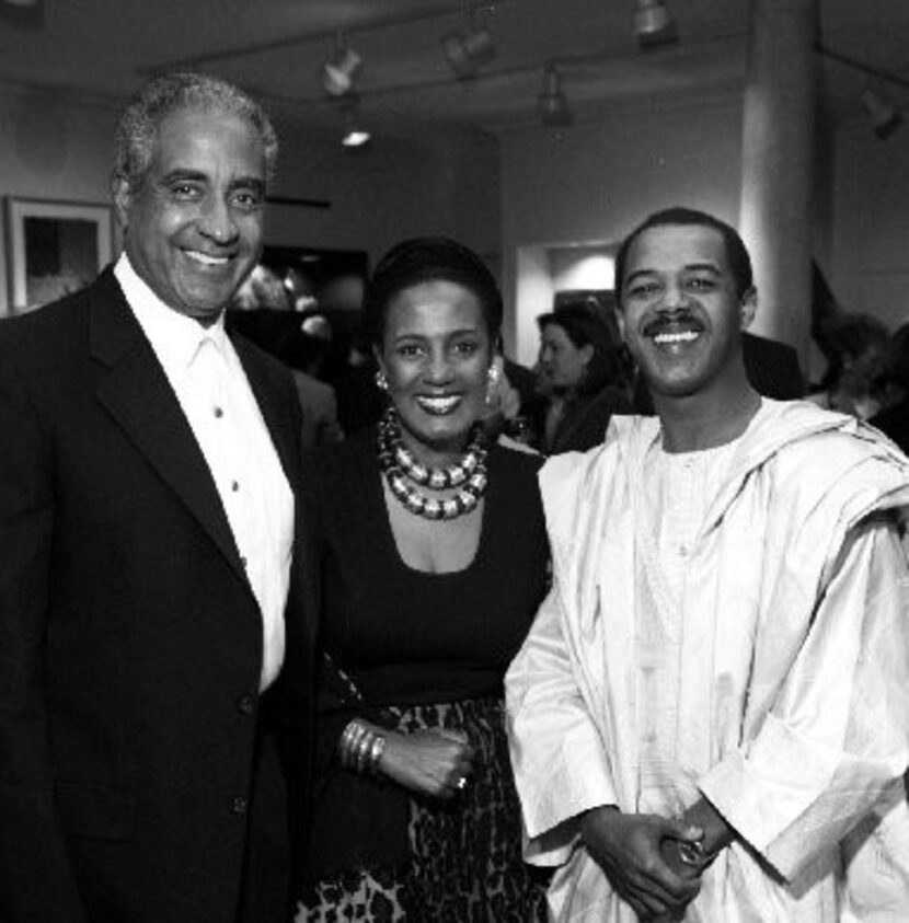 Mohamed Toure (right) attended the grand opening of his wife's store, Out of Africa, in...