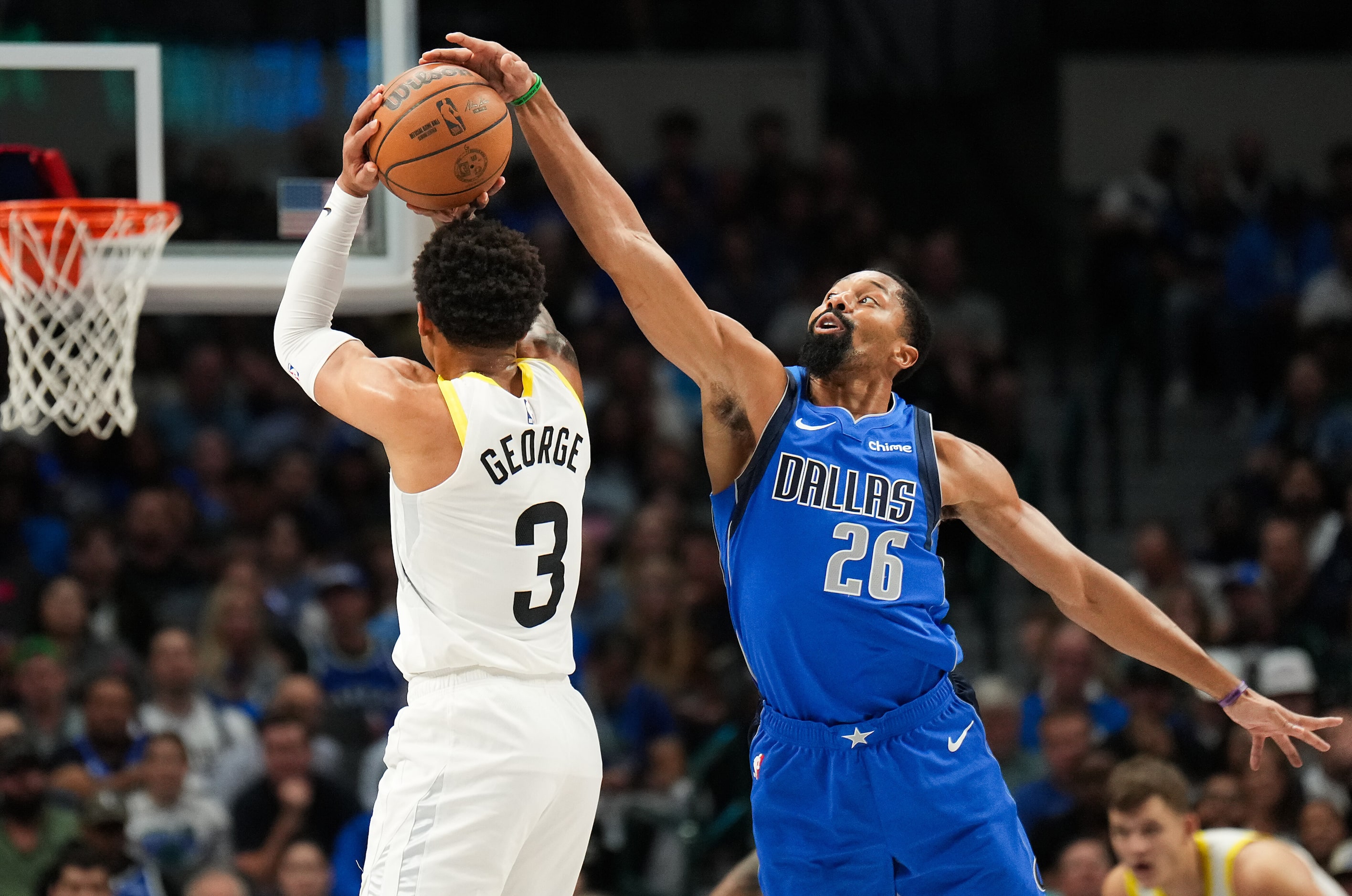 Dallas Mavericks guard Spencer Dinwiddie (26) blocks a shot by Utah Jazz guard Keyonte...