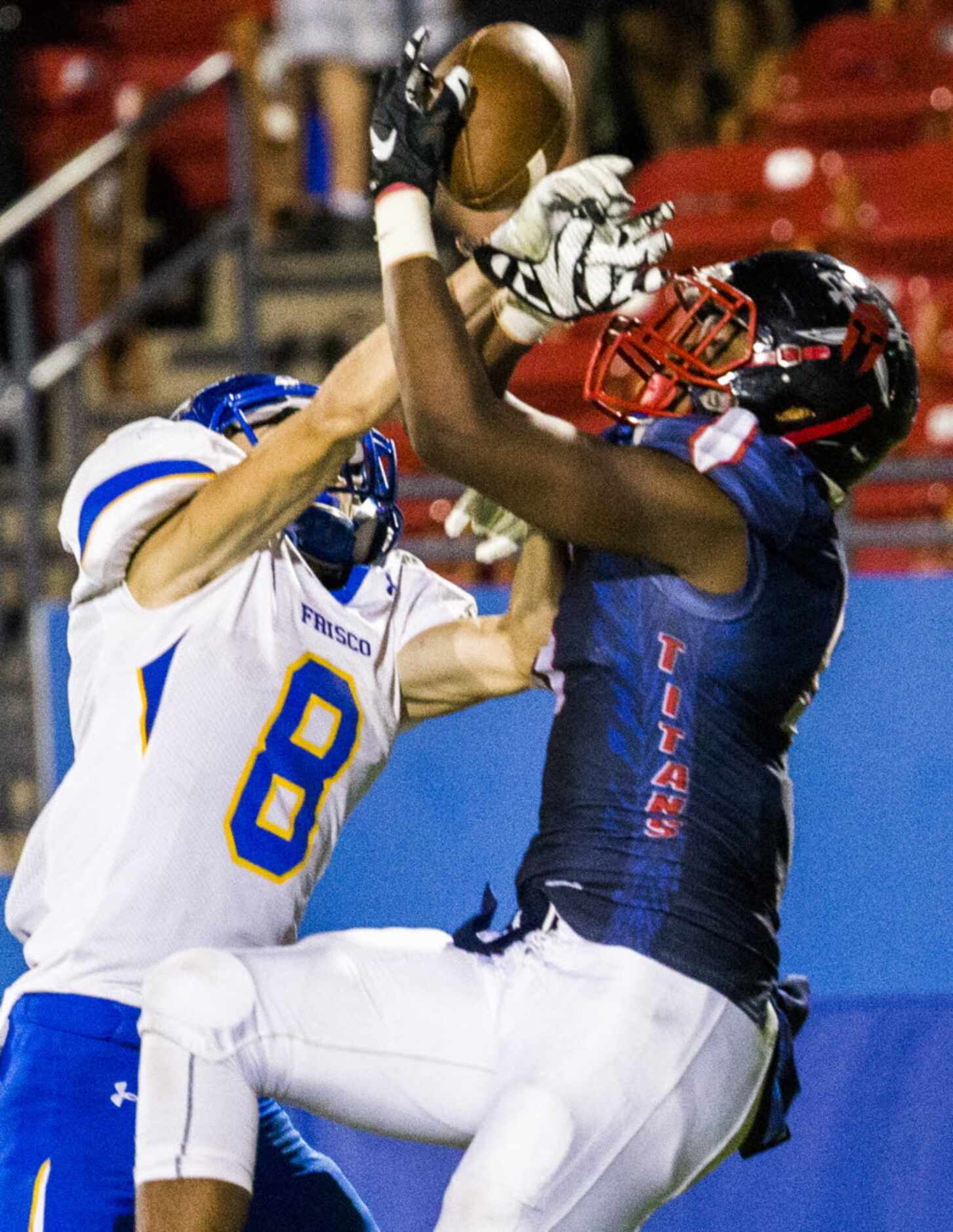 Frisco Centennial wide receiver Kenny Nelson (5) catches a pass in the end zone for a...