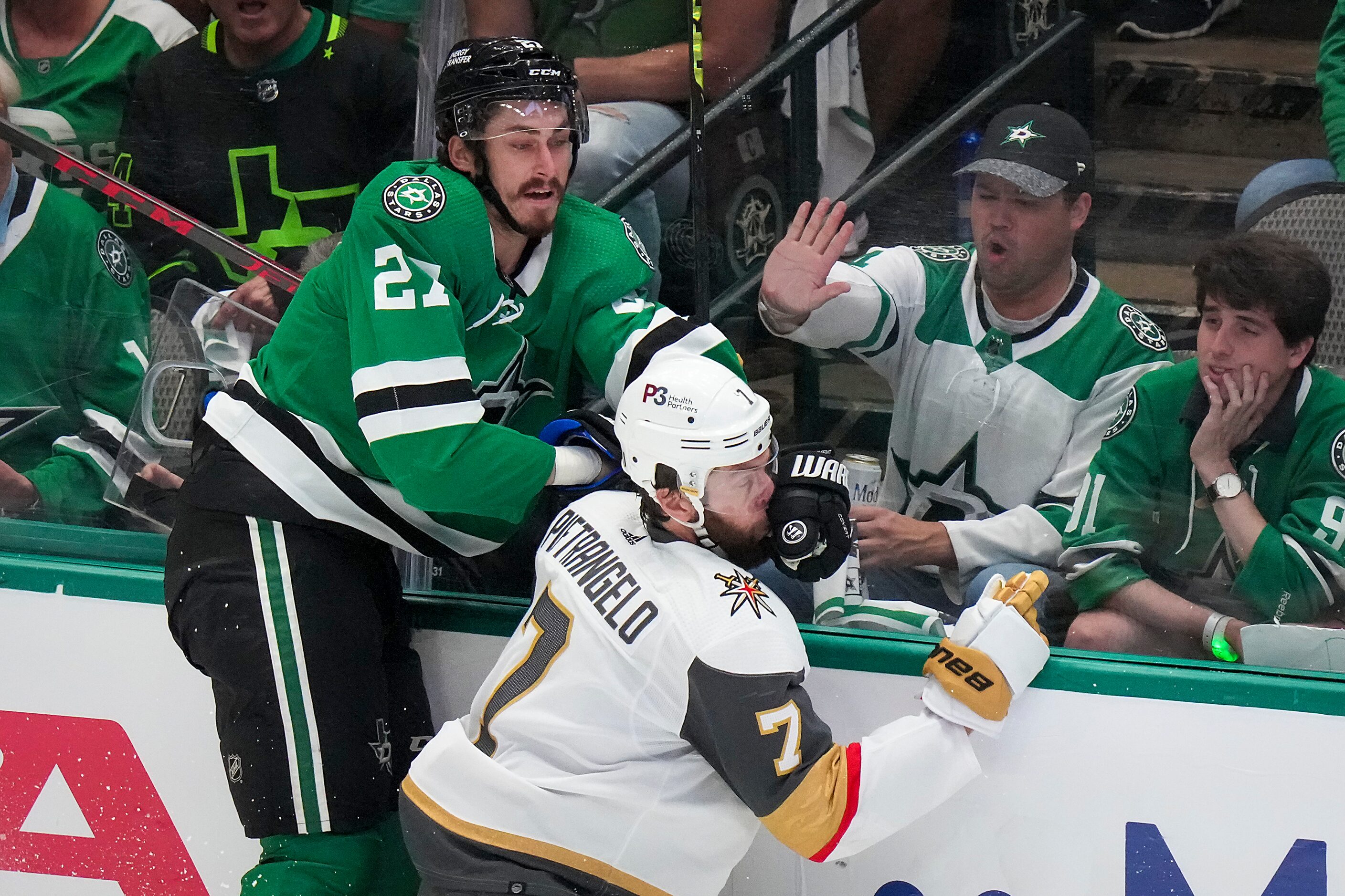 Dallas Stars left wing Mason Marchment (27) checks Vegas Golden Knights defenseman Alex...