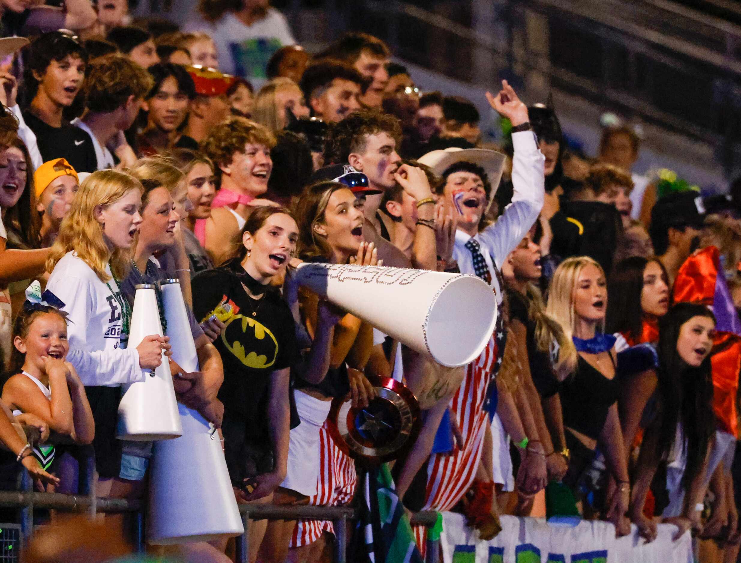 V.R. Eaton High School fans and students cheer for their team in the second half of a game...