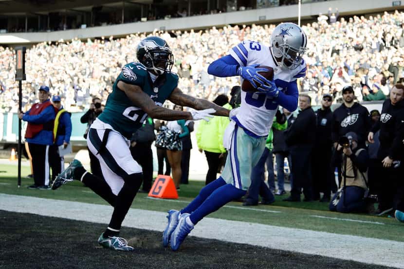 Dallas Cowboys' Terrance Williams (83) pulls in a touchdown pass against Philadelphia...