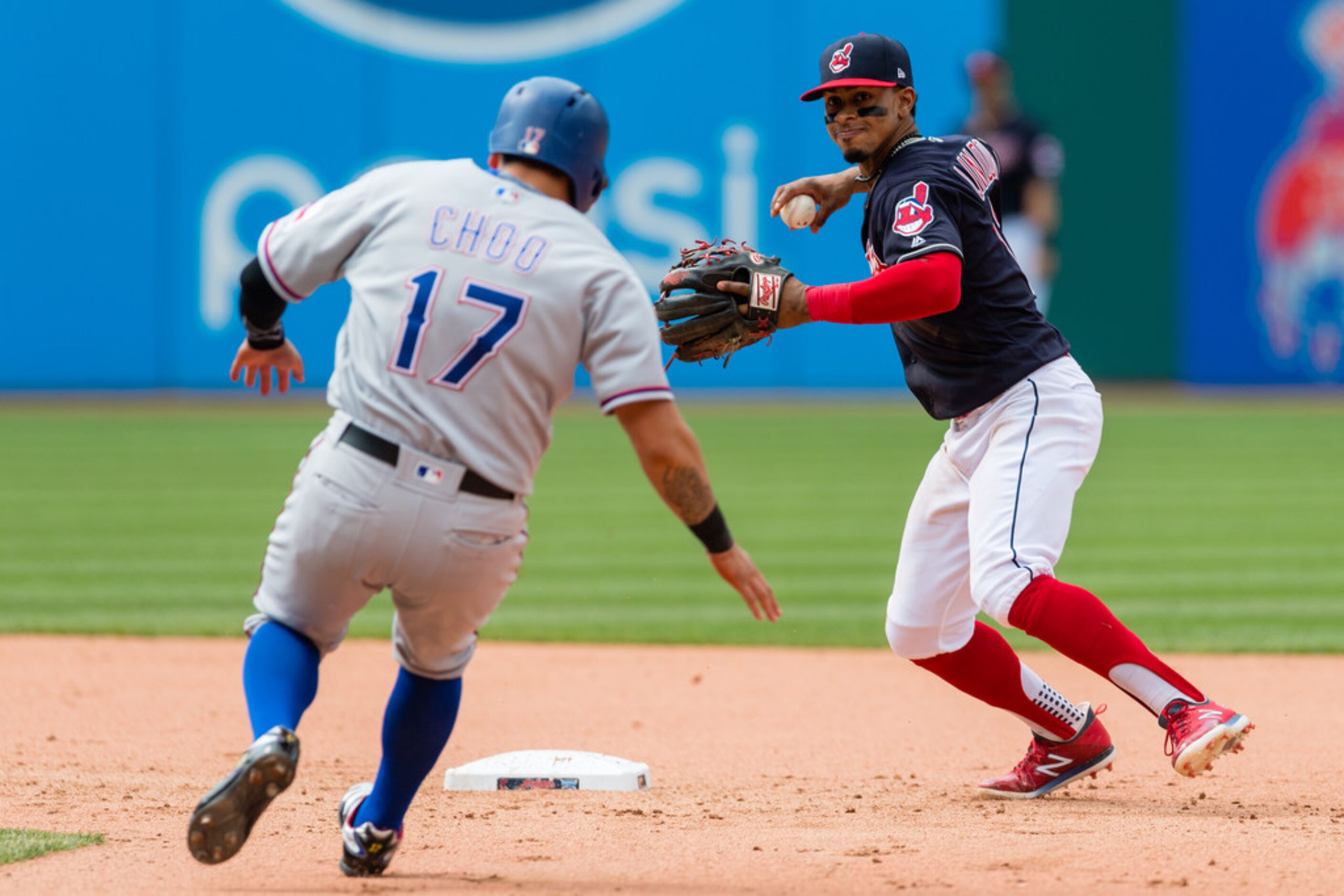 CLEVELAND, OH - MAY 2: Shortstop Francisco Lindor #12 of the Cleveland Indians throws out...