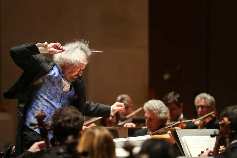 Conductor Carlos Kalmar conducts the Dallas Symphony Orchestra during a concert on Feb. 28,...