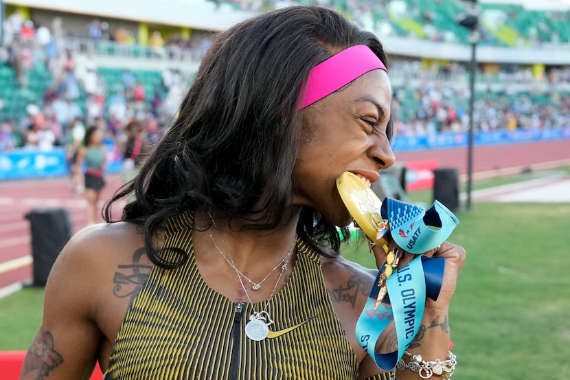 Sha'Carri Richardson celebrates her win in the wins women's 100-meter run final during the...