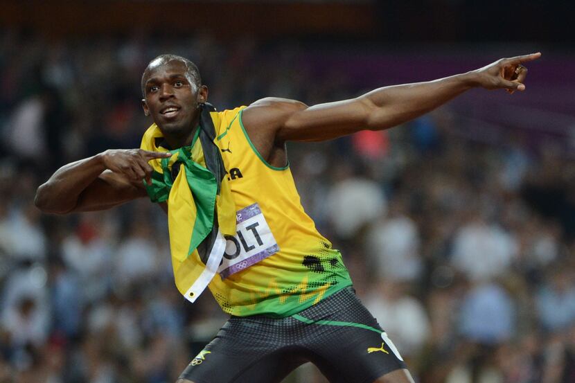 TOPSHOTS Jamaica's Usain Bolt celebrates after winning the men's 200m final at the athletics...
