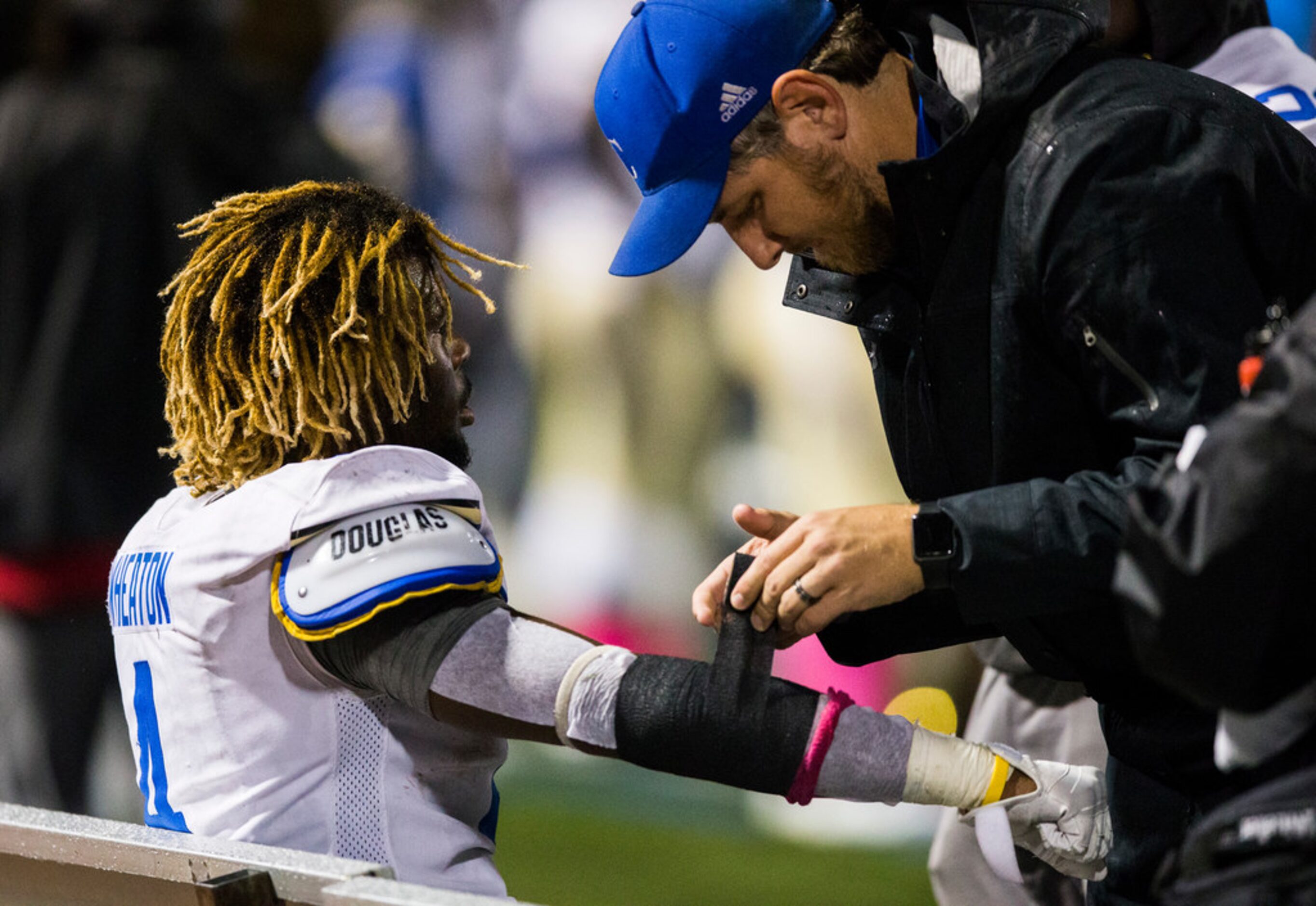 Garland Lakeview running back Camar Wheaton (4) has his right arm wrapped during the second...